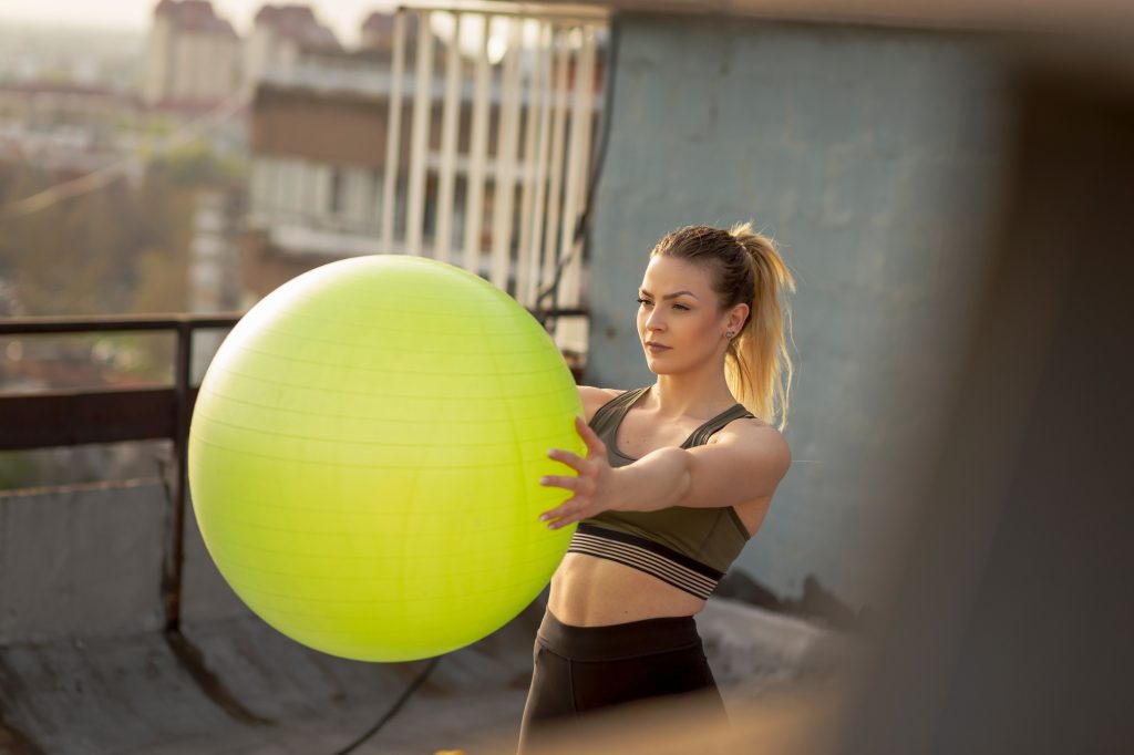 Working out with a pilates ball